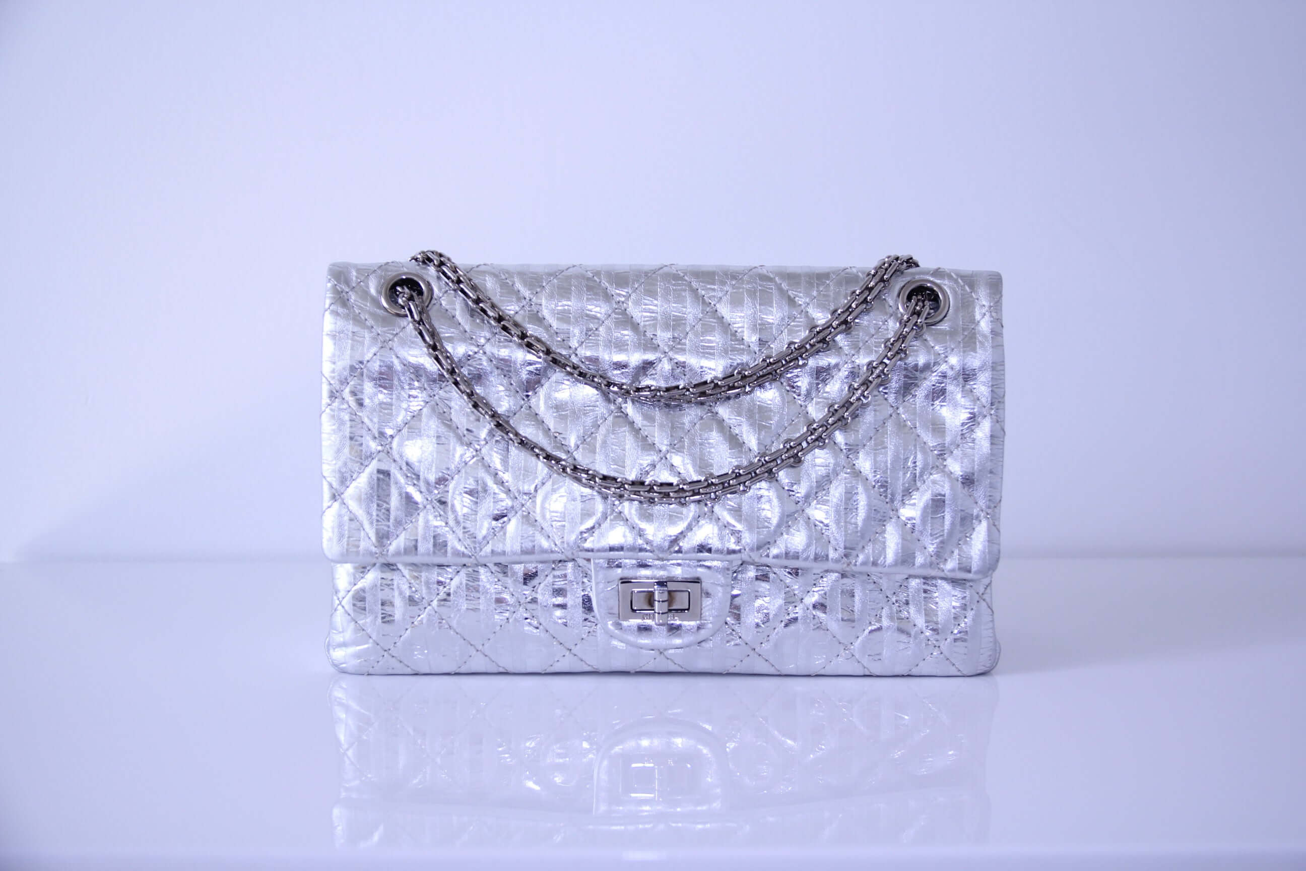 Front of Medium Chanel handbag in finished in stripped silver calfskin
