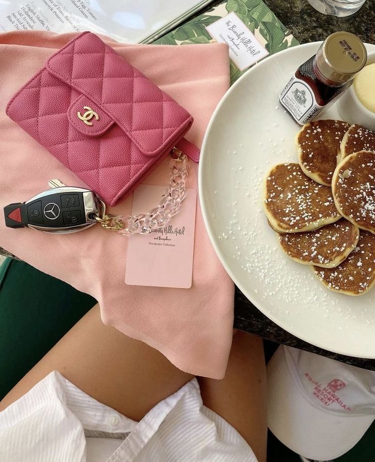 Pink Chanel wallet with Mercedes keys and keychain breakfast at Beverly Hills Hotel