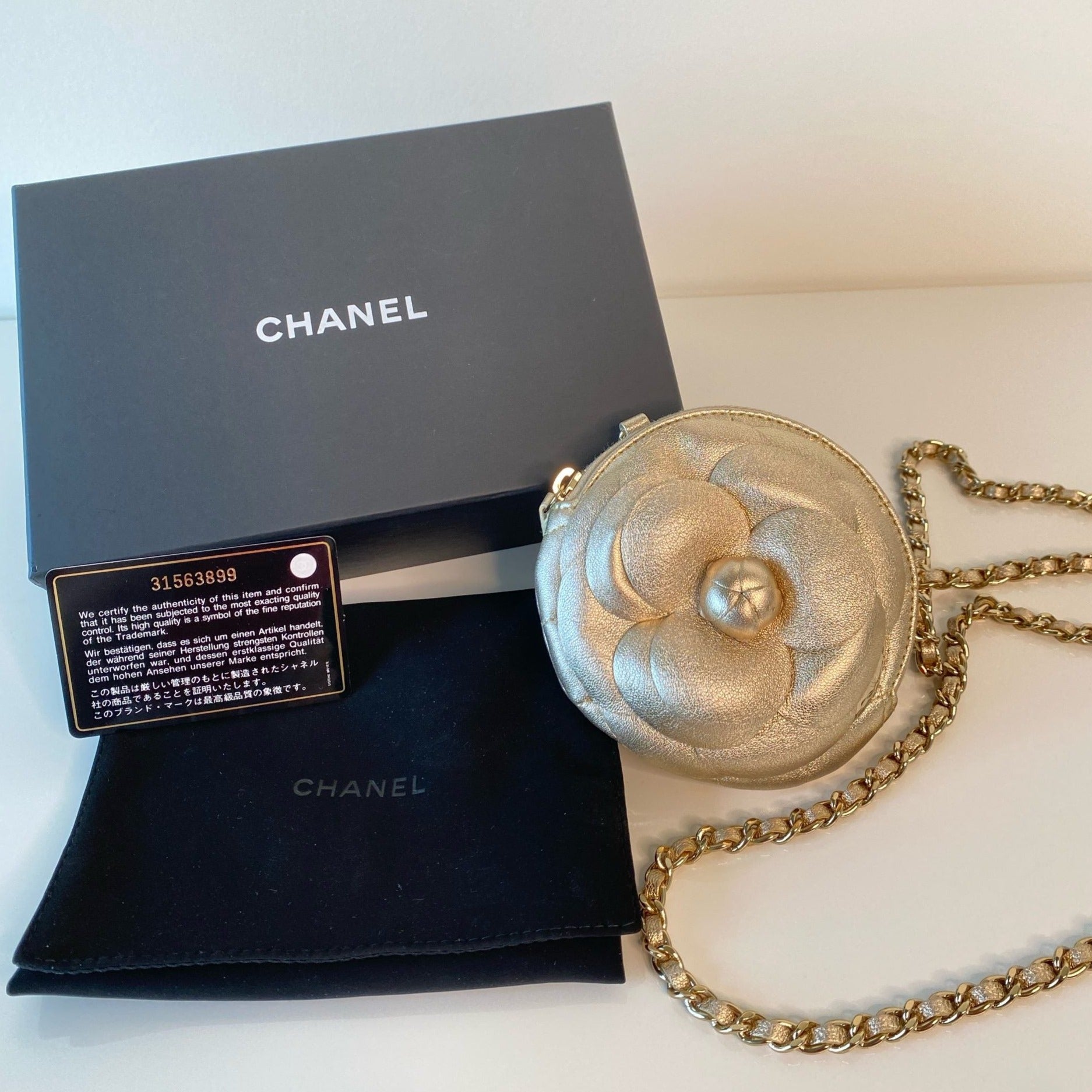 Chanel Grey Chèvre Camellia Embossed Round Clutch With Chain Silver  Hardware, 2019 Available For Immediate Sale At Sotheby's