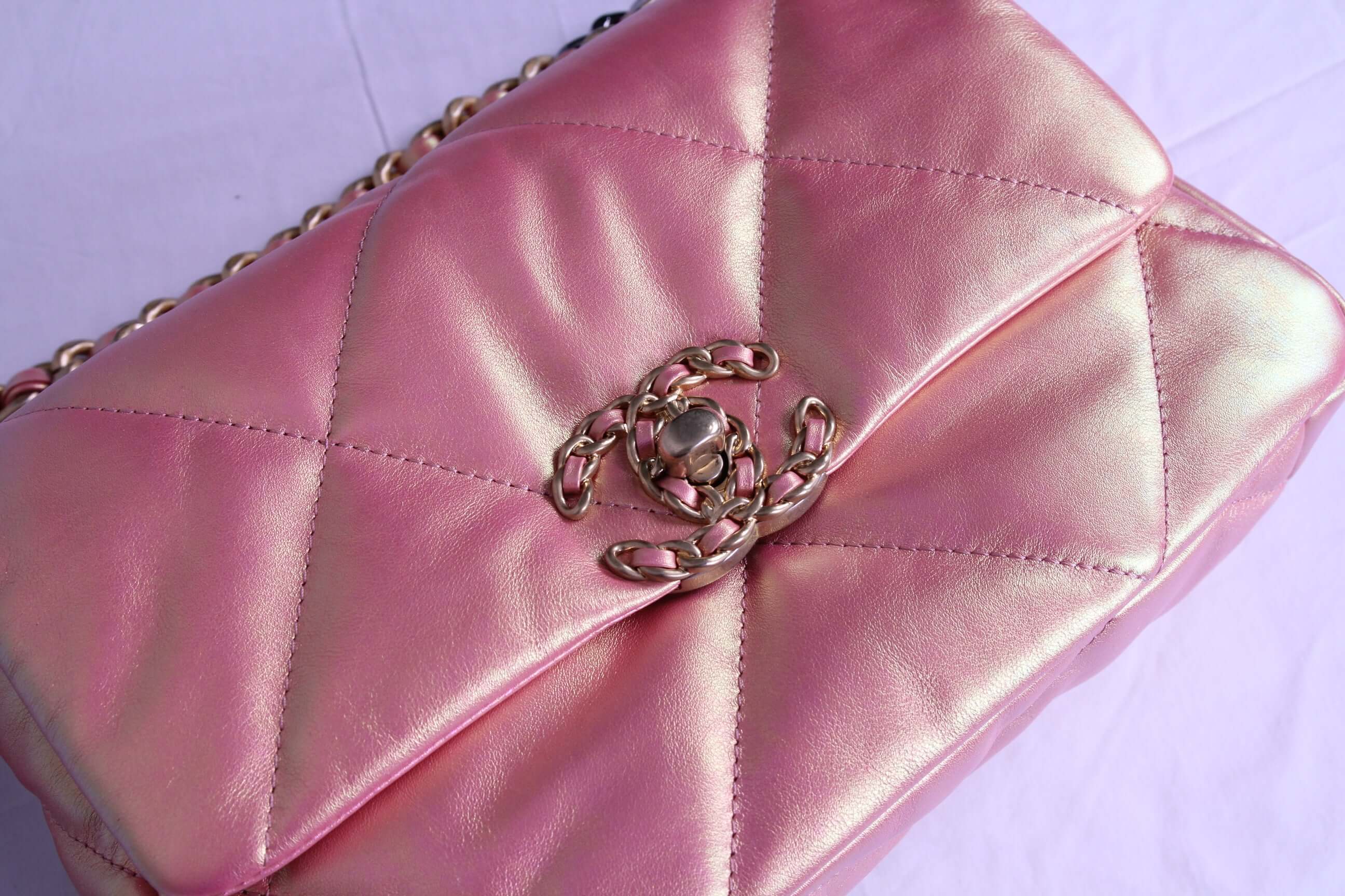 Front of Medium Chanel handbag in finished in metallic pink