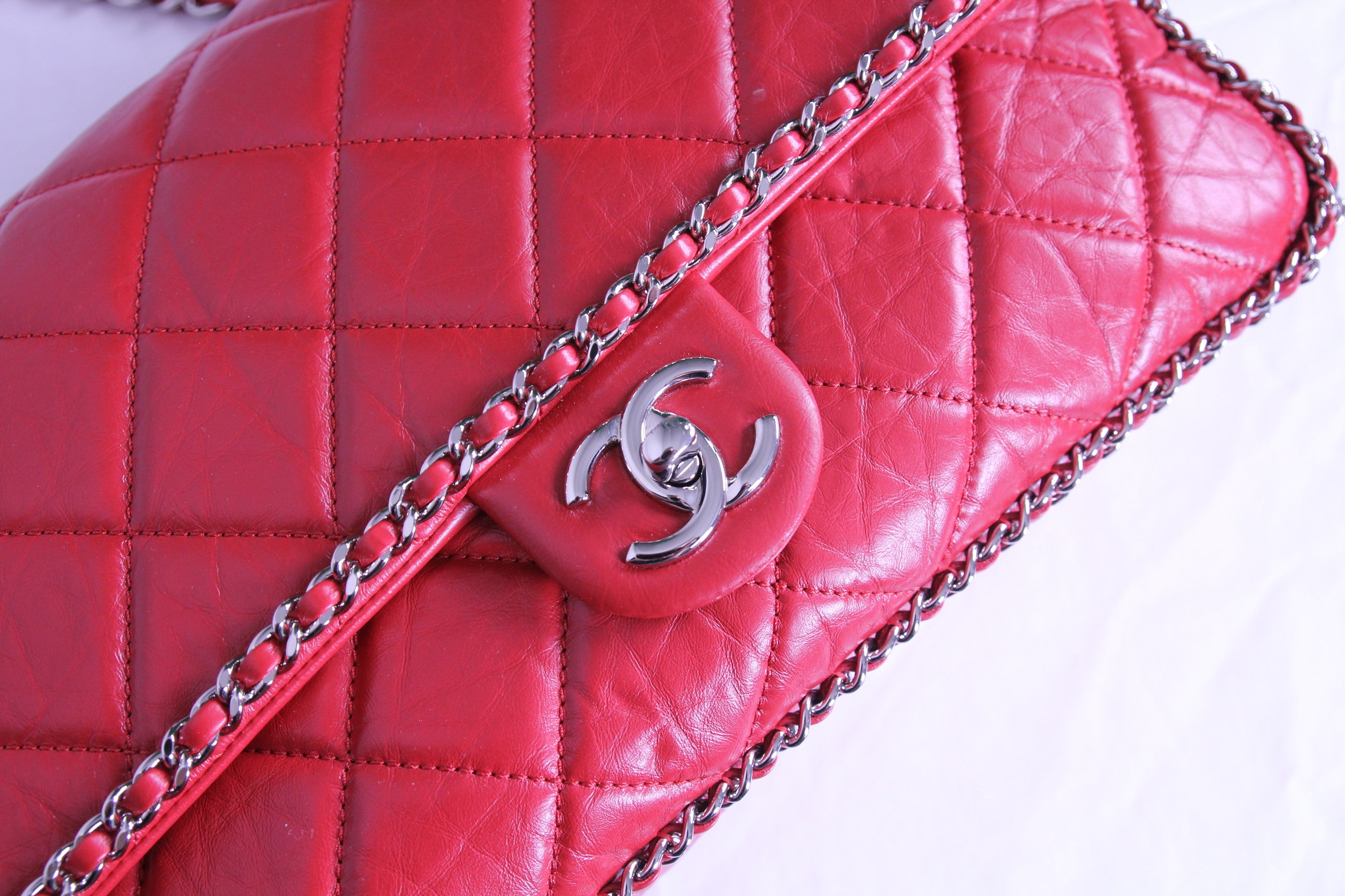 Front of large Chanel flap finished in aged red calfskin