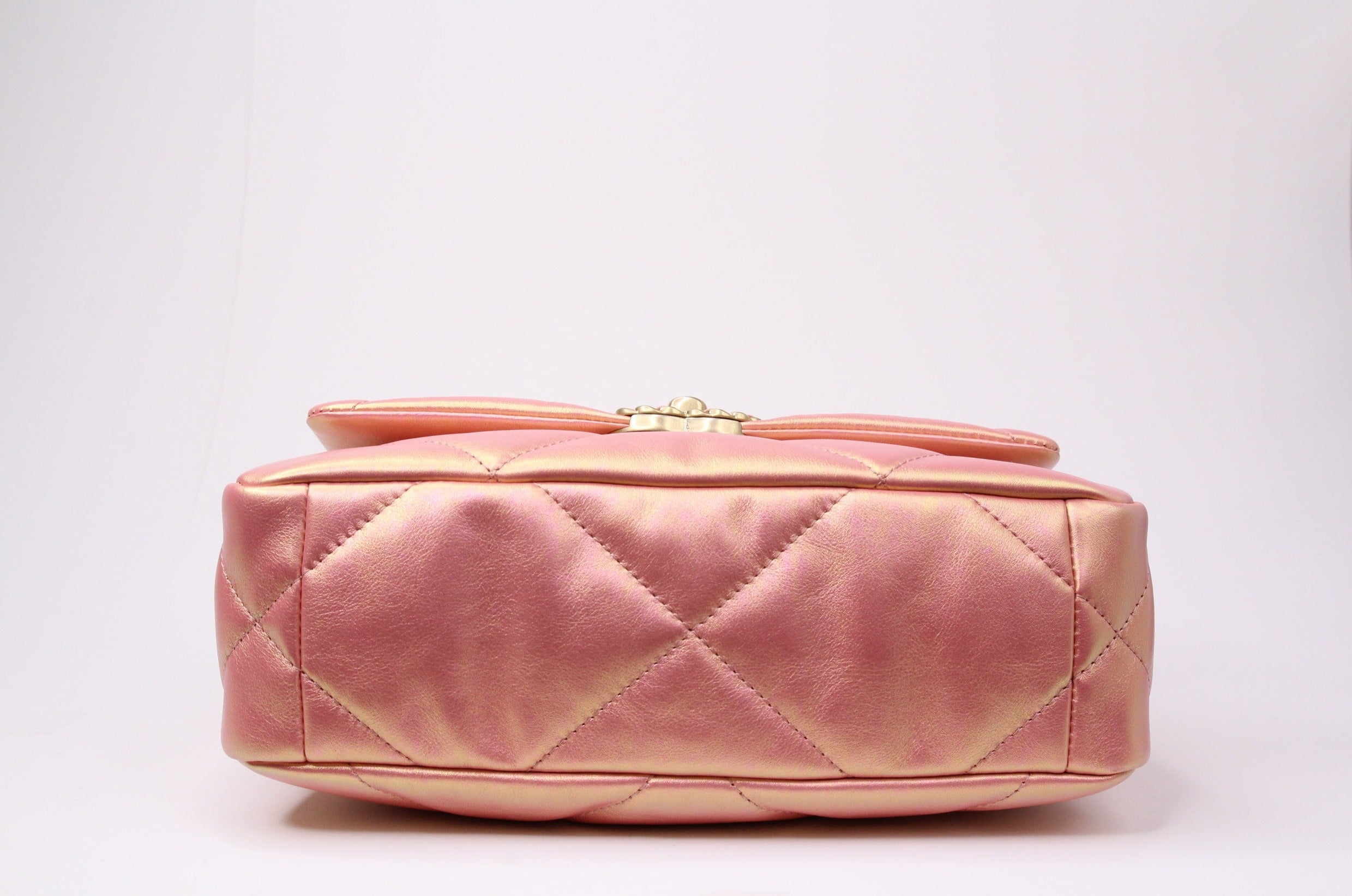 The bottom of a CHANEL 19 Flap Small Pink Goatskin handbag