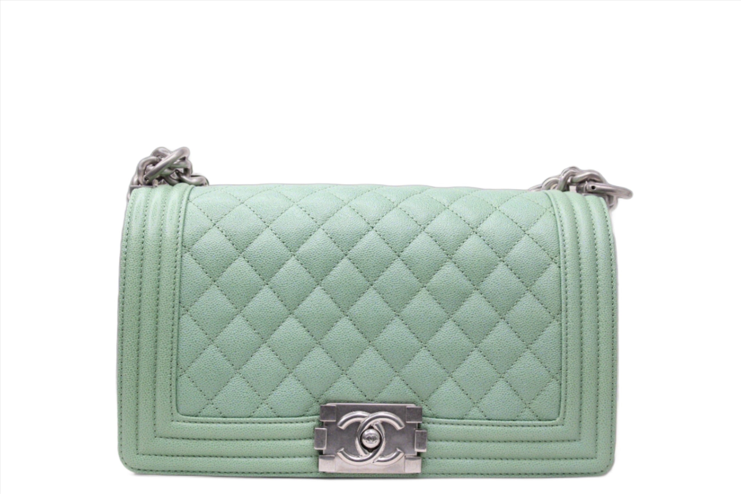 Front of Chanel boy bag finished in mint green caviar